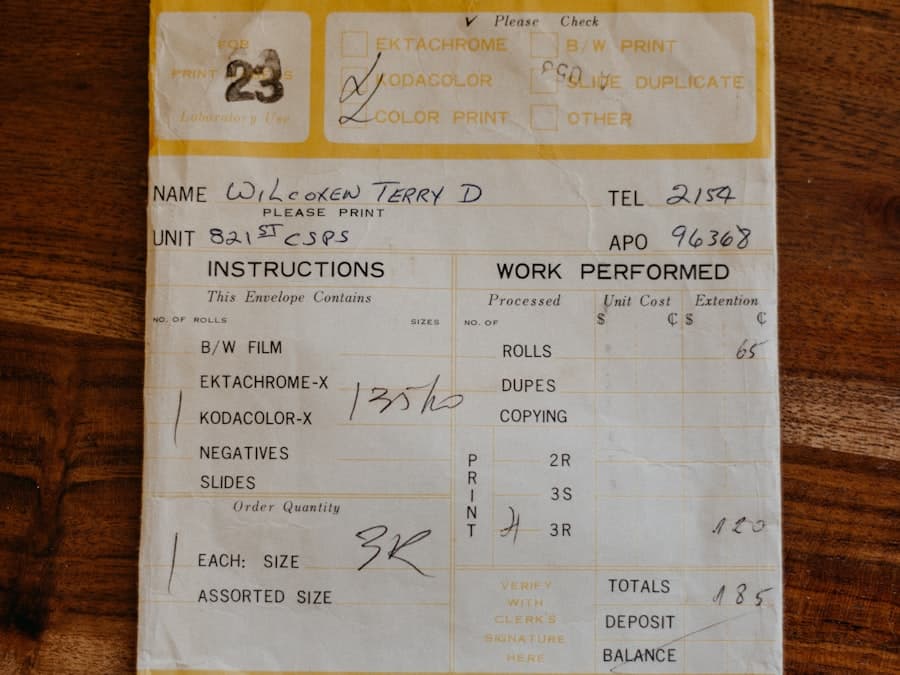 Completed job sheet listing the work performed, with handwritten entries